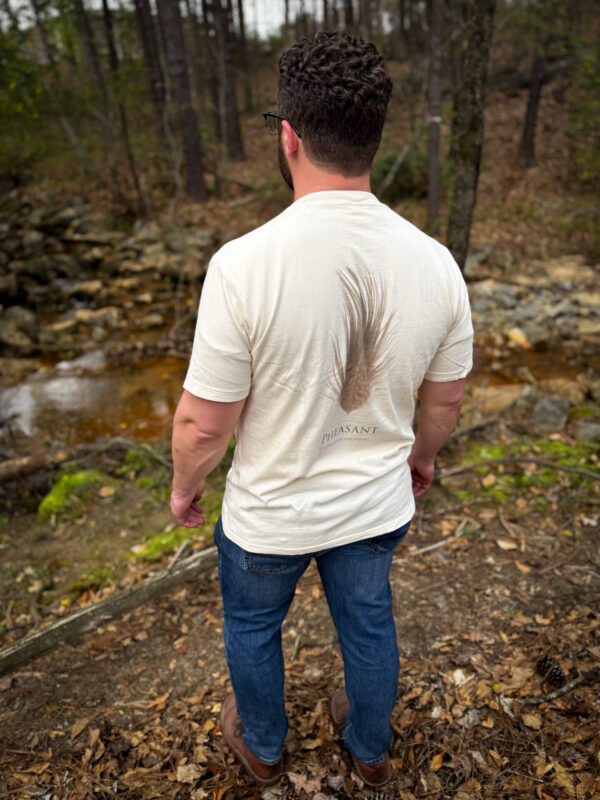 IMG_6458 Man standing in forest wearing pheasant t-shirt.
