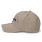 Beige baseball cap with embroidered blue logo.