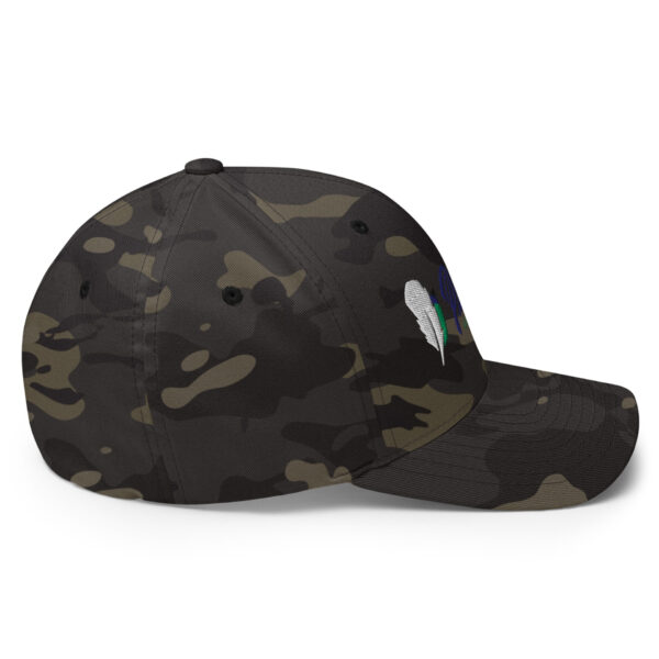 closed-back-structured-cap-multicam-black-right-6827ff180b6dc.jpg Camo baseball cap with feather design on side.