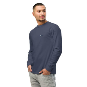 unisex-garment-dyed-heavyweight-long-sleeve-shirt-navy-left-front-6827f96aacc5d.jpg Man wearing blue long-sleeve shirt, looking sideways.