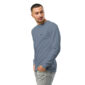 Man wearing blue long-sleeve shirt and jeans