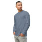 Man in blue long-sleeve shirt, hands in pockets.