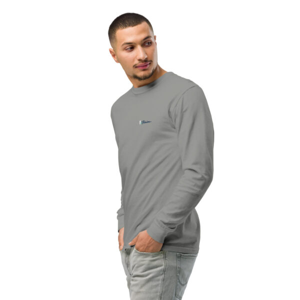unisex-garment-dyed-heavyweight-long-sleeve-shirt-grey-left-front-2-68dfdaf0dd583.jpg Man wearing a gray long-sleeve shirt, looking sideways.