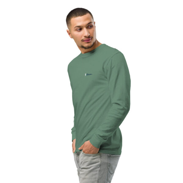 unisex-garment-dyed-heavyweight-long-sleeve-shirt-light-green-left-front-2-68e007419a712.jpg Man wearing green long-sleeve t-shirt and jeans.