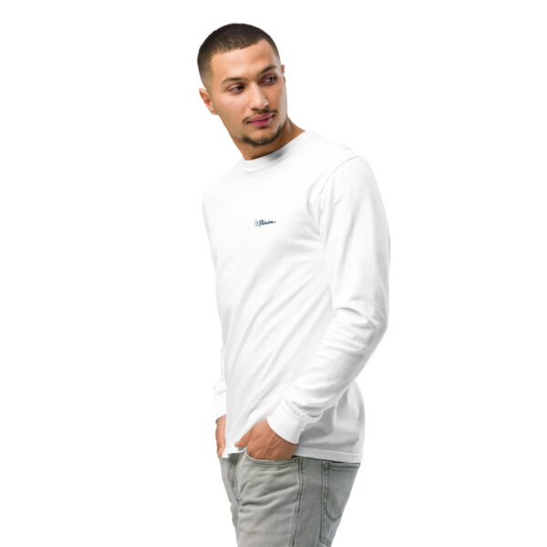unisex-garment-dyed-heavyweight-long-sleeve-shirt-white-left-front-2-68e006668e0c2.jpg Man modeling white long-sleeve shirt, casual style.