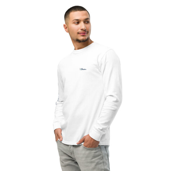 unisex-garment-dyed-heavyweight-long-sleeve-shirt-white-left-front-68e0083baeb45.jpg Man modeling white long-sleeve shirt, smiling.