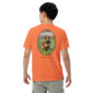 Man in orange shirt with dog photo on back.