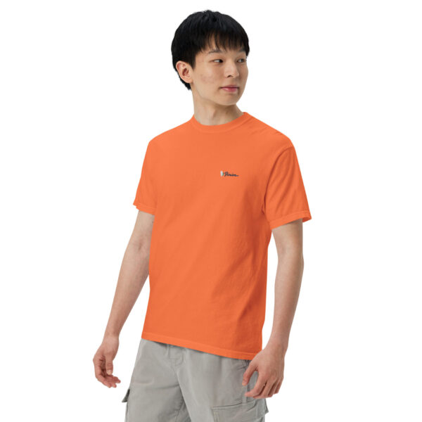 unisex-garment-dyed-heavyweight-t-shirt-burnt-orange-left-front-691ce80e3f9ca.jpg Man wearing orange t-shirt and gray shorts.