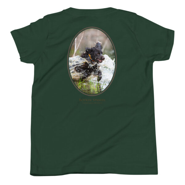 youth-staple-tee-forest-back-69a6e26fa04ef.jpg Boykin Spaniel running through water on green shirt.