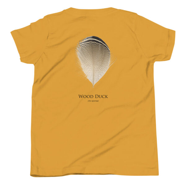youth-staple-tee-mustard-back-69a6e77a1bc38.jpg Yellow shirt with wood duck feather illustration.