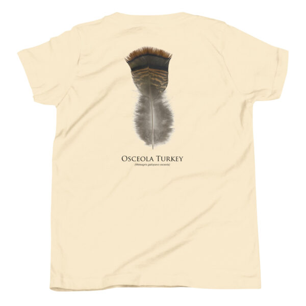 youth-staple-tee-natural-back-69a6ddb06040c.jpg Osceola Turkey feather on back of beige shirt