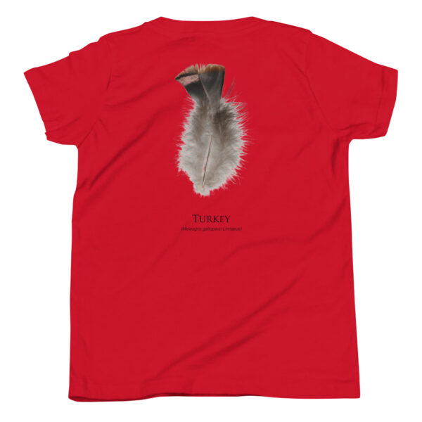 youth-staple-tee-red-back-69a6e84d8a400.jpg Red T-shirt with turkey feather design.